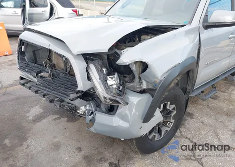 2020 Toyota Tacoma Trd Off-Road z USA, uszkodzony, nr VIN 3TMCZ5AN2LM323056